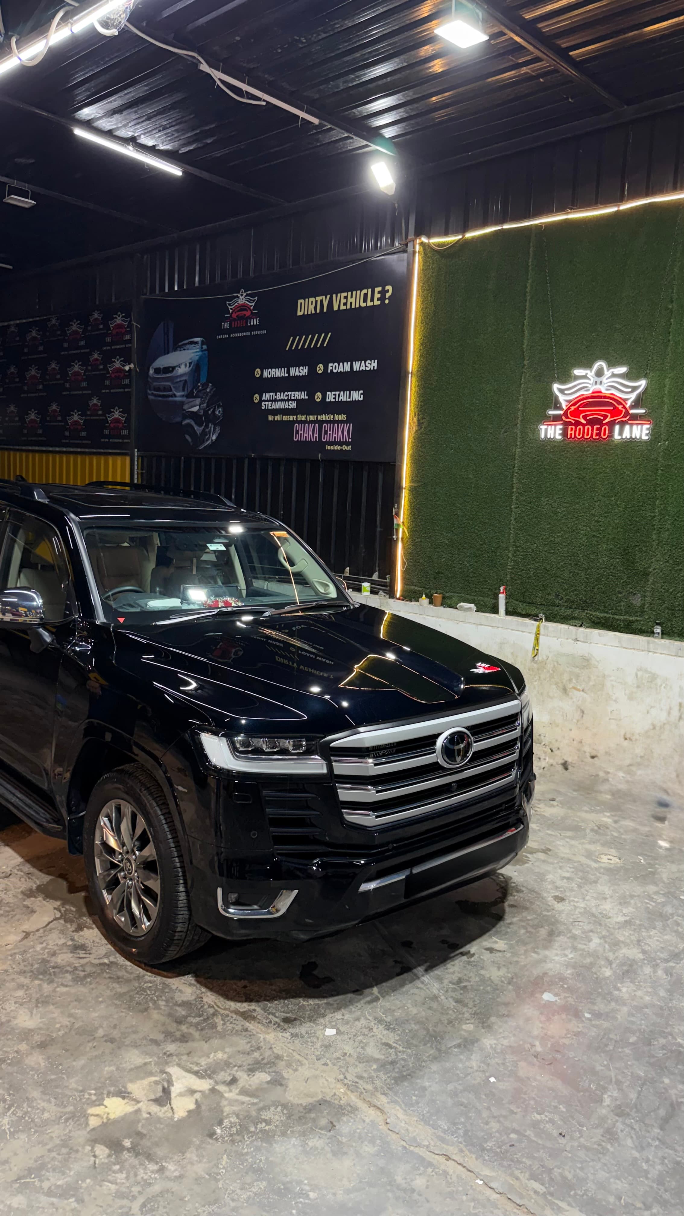 Black SUV finished inside The Rodeo Lane detailing studio